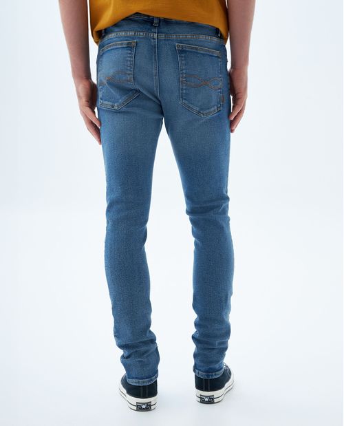 Jean Tapered tono medio con tallones para hombre