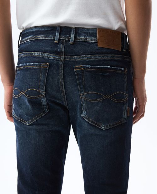 Jean slim tono oscuro para hombre