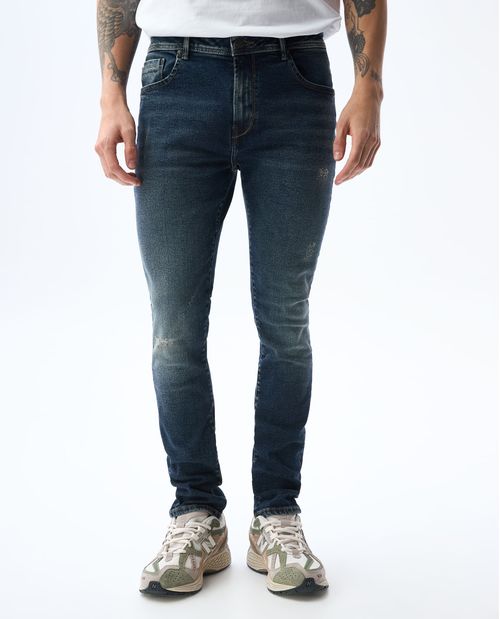Jean Skinny tono oscuro con tallones para hombre