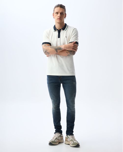 Jean Skinny tono oscuro con tallones para hombre