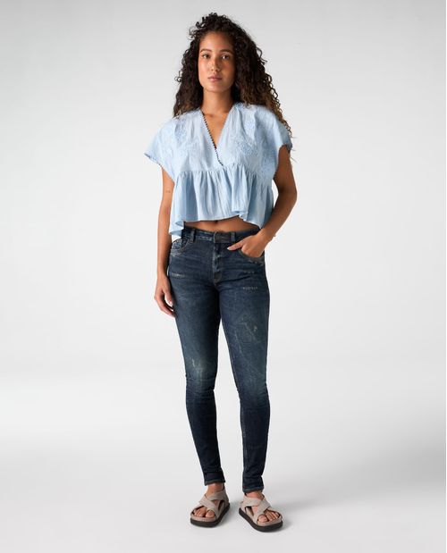Jean Jegging tono oscuro con rotos para mujer